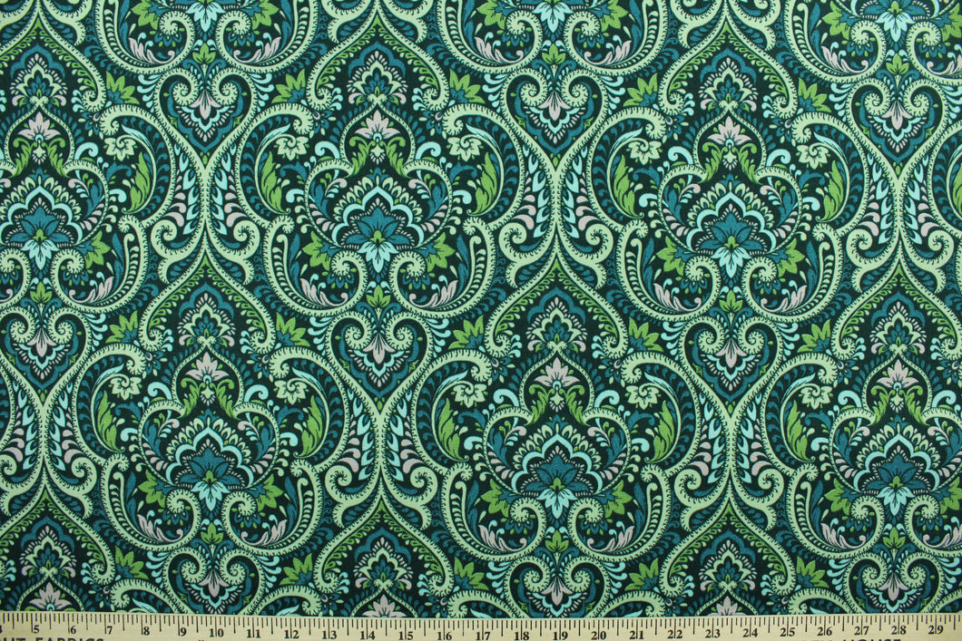 This Solarium outdoor decorative print features an elaborate damask design in emerald, light blue, lime, navy and pink.  This versatile, long-lasting fabric can withstand up to 500 hours of sunlight, water and stain resistant and has 15,000 double rubs.  It is perfect for lounge cushions, pool furniture, tablecloths, decorative pillows and upholstery projects.  This fabric has a slightly stiff feel but is easy to work with.  