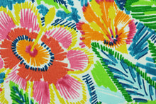 Load image into Gallery viewer, This Solarium outdoor decorative print features bright colorful flowers and foliage in red, green, blue, orange and pink against a white background.  This versatile, long-lasting fabric can withstand up to 500 hours of sunlight, water and stain resistant and has 10,000 double rubs.  It is perfect for lounge cushions, pool furniture, tablecloths, decorative pillows and upholstery projects.  This fabric has a slightly stiff feel but is easy to work with.  
