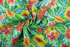 This Solarium outdoor decorative print features bright colorful flowers and foliage in red, green, blue, orange and pink against a white background.  This versatile, long-lasting fabric can withstand up to 500 hours of sunlight, water and stain resistant and has 10,000 double rubs.  It is perfect for lounge cushions, pool furniture, tablecloths, decorative pillows and upholstery projects.  This fabric has a slightly stiff feel but is easy to work with.  