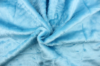 A faux fur in a light blue . 