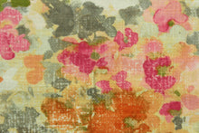 Load image into Gallery viewer, Fleurie is a multipurpose, watercolor, floral design on a linen and cotton print cloth with woven small basketweaves that adds texture to the design.  It can be used for several different statement projects including window accents (drapery, curtains and swags), decorative pillows, cornice boards, bed skirts, duvet covers, upholstery and craft projects.  It has a soft workable feel yet is stable and durable with 10,000 double rubs.  Colors included are peach, rose, pink, gray, green and off white.
