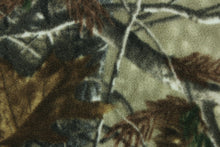 Load image into Gallery viewer, This ultra soft, medium weight printed fleece is the go to fabric for warmth.  The camouflage design features branches and leaves in the colors of green, gray, black and brown.  It is perfect for creating jackets, vests, scarves, gloves, throws, bedding and more! 
