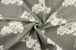 This fabric features a floral design in a dull white against a gray background.