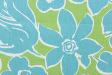 Load image into Gallery viewer, The cabana has a bright green background with aqua blue flowers with white outlines. 
