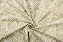 Load image into Gallery viewer,  This fabric features a chevron design in shades of brown, beige, taupe, and white . 
