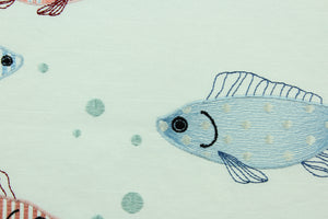 This cute and fun fabric features fish embroidered in shades red and blue against a white background.  Uses include drapery, pillows, light upholstery, table runners, bedding, headboards, home décor and apparel.  
