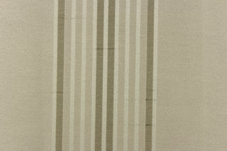 This light weight  fabric offers a formal feel. Featuring a  vertical striped pattern  in colors of  taupe with a  slight sheen to enhance the rich colors and overall design. 