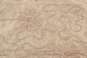 Rosy Meadow in pink features a fine corded embroidery in a flowery design.  The sheen and texture enhances and adds an elegant look to the fabric.  Uses include window treatments, accent pillows, bedding, cornice boards and home décor.