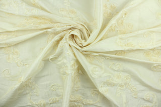 Blooming Botanicals is a beautiful and elegant fabric that features flowing rosette flowers in cream.  The fabric is voluminous and dimensional and would be perfect for special occasion apparel, costumes, backdrops, accent pillows, duvet covers and home décor.