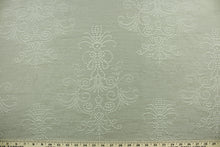 Load image into Gallery viewer, Steel Imprints features a large scale embroidered medallion design in gray.  The embroidered design adds an elegant look to the fabric.  Uses include apparel, decorative pillows, window treatments and bedding.
