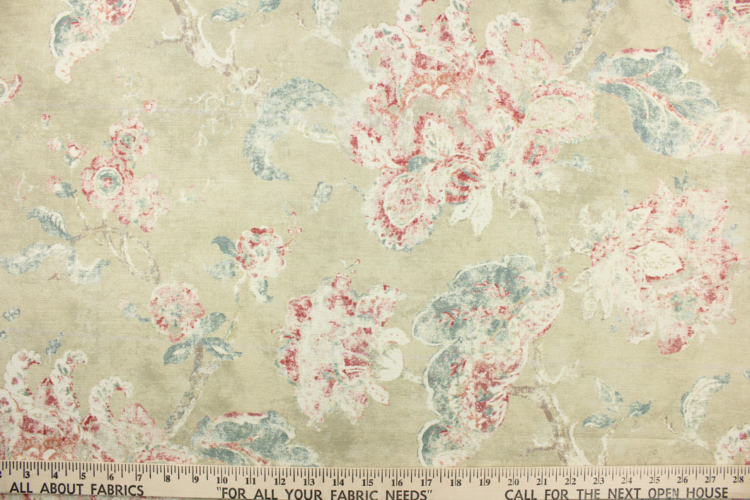 This fabric features a rose design in pink, blue gray, dull white against a pale tan background. 