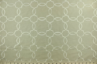 This fabric features a large geometrical design beige.  The embroidered design adds an elegant look to the fabric.  Uses include window treatments, accent pillows, bedding, cornice boards and home décor.