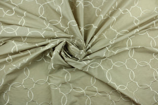 This fabric features a large geometrical design beige.  The embroidered design adds an elegant look to the fabric.  Uses include window treatments, accent pillows, bedding, cornice boards and home décor.