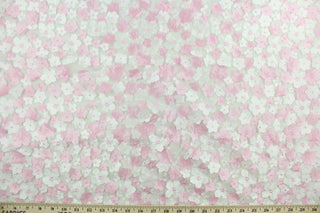 This fabric features beautiful flowers petals in pink and white embroidered on to a white tulle net backing.  The sheer fabric is see through with a nice flowy drape.  It is perfect for special occasion apparel, costumes, overlays, table tops, décor, sheer curtains and more.  
