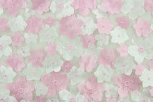Load image into Gallery viewer, This fabric features beautiful flowers petals in pink and white embroidered on to a white tulle net backing.  The sheer fabric is see through with a nice flowy drape.  It is perfect for special occasion apparel, costumes, overlays, table tops, décor, sheer curtains and more.  
