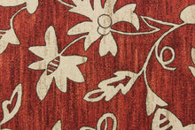 Load image into Gallery viewer, This simple, pretty floral design in beige or tan against a cayenne red background 
