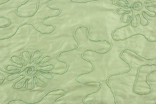 Marshy Meadow in green features a fine corded embroidery in a flowery design.  The sheen and texture enhances and adds an elegant look to the fabric.  Uses include window treatments, accent pillows, bedding, cornice boards and home décor.