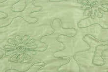 Load image into Gallery viewer, Marshy Meadow in green features a fine corded embroidery in a flowery design.  The sheen and texture enhances and adds an elegant look to the fabric.  Uses include window treatments, accent pillows, bedding, cornice boards and home décor.
