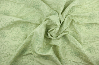 Marshy Meadow in green features a fine corded embroidery in a flowery design.  The sheen and texture enhances and adds an elegant look to the fabric.  Uses include window treatments, accent pillows, bedding, cornice boards and home décor.
