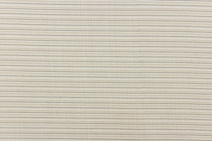 This sheer fabric features a stripe design in a tan, white, beige, and black.