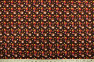 This screen printed fabric features vintage bubbles in shades of brown, pink, red, purple, yellow and orange against a dark brown background.  The versatile lightweight fabric is soft and easy to sew.  It would be great for quilting, crafting and sewing projects.  