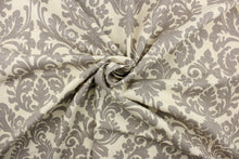 Load image into Gallery viewer, This fabric features a demask design in gray against a natural background .
