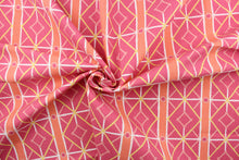 Load image into Gallery viewer, This very unique fabric with a tropical theme, feature a geometric pattern of bamboo looking diamonds, stripes and circles in pink, light orange, white and a light yellow. 
