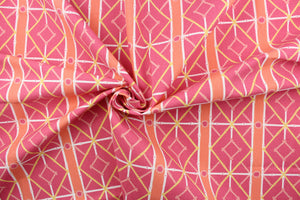This very unique fabric with a tropical theme, feature a geometric pattern of bamboo looking diamonds, stripes and circles in pink, light orange, white and a light yellow. 