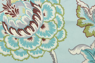 This fabric features a floral design in green, gray, cream, light blue, brown, and turquoise.