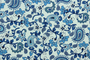  Scripture features a floral and paisley print in shades of blue against a white background.  The versatile lightweight fabric is soft and easy to sew.  It would be great for quilting, crafting and sewing projects.  