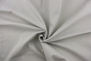his fabric features a stripe design in gray and white .