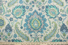 Load image into Gallery viewer, This fabric features a damask floral design in lime green, turquoise, teal, blue, and gray against a taupe background
