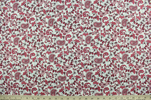 Scripture features a floral and paisley print in shades of rose against a white background.  The versatile lightweight fabric is soft and easy to sew.  It would be great for quilting, crafting and sewing projects.  