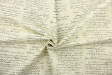 Load image into Gallery viewer,  This fabric features a printed script design in black against a beige background it was printed to give an aged appearance to the cloth. 

