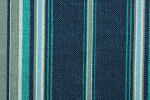 Terrace is an outdoor fabric featuring stripes in shades of blue, teal and gray.  It is perfect for outdoor settings or indoors in a sunny room.  Solarium fabrics can withstand up to 500 hours of sunlight, water and stain resistant and has a rating of 10,000 double rubs.  Uses include toss pillows, cushions, upholstery, pool furniture, tote bags and more.