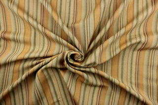 This rich woven yarn dyed fabric features bold multi width striped pattern in golden yellow, moss green, tan brown, beige, with hints of gray.