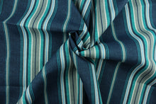 Load image into Gallery viewer, Terrace is an outdoor fabric featuring stripes in shades of blue, teal and gray.  It is perfect for outdoor settings or indoors in a sunny room.  Solarium fabrics can withstand up to 500 hours of sunlight, water and stain resistant and has a rating of 10,000 double rubs.  Uses include toss pillows, cushions, upholstery, pool furniture, tote bags and more.
