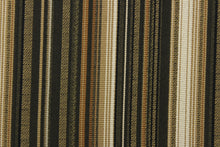 Load image into Gallery viewer, This rich woven yarn dyed fabric features bold multi width striped pattern in black, gold, cream, beige, tan, and bronze. 
