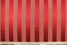 Load image into Gallery viewer, This stunning yarn dyed fabric features a  wide striped pattern in rich red tone.
