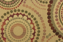 Load image into Gallery viewer, This contemporary geometric design features overlapping circles and dots in red, beige, green, brown, and burgundy.
