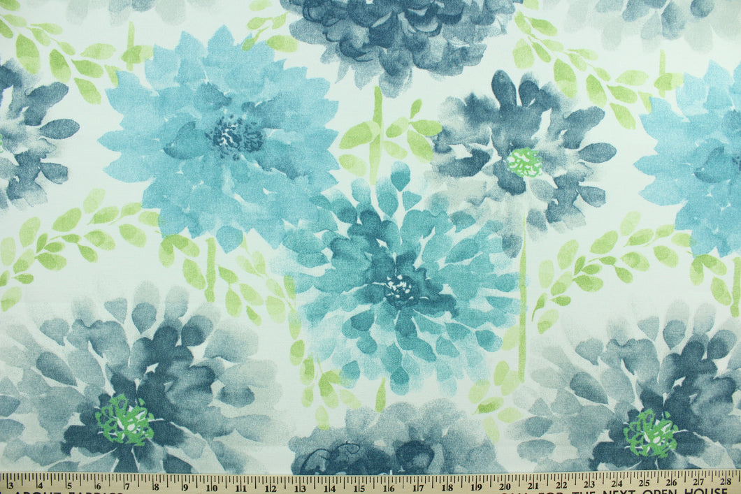 This screen printed fabric features large flowers in blue tones, turquoise and green set against a solid white background. It is perfect for any project where the fabric will be exposed to the weather.  Able to resist stains and water, and has a rating of 10,000 double rubs, UV tested and can withstand 500 hours of direct sunlight  Uses include cushions, tablecloths, upholstery projects, decorative pillows and craft projects. This fabric has a slightly stiff feel but is easy to work with.  