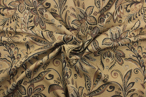 This tapestry features a floral design in black, brown, tan, beige, and hints of cream. 