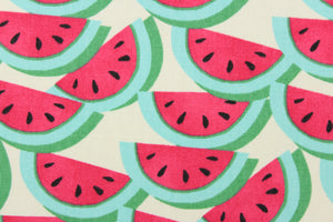 This fabric features a watermelon design in rich pink, light blue, black, and green against a dull white background . 