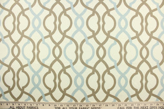 This fabric features a geometric design in light blue and taupe against a off white background. 
