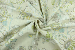 Almada features a large scale floral design in blue, green, yellow, brown and cream.  It can be used for several different statement projects including window accents (drapery, curtains and swags), decorative pillows, hand bags, bed skirts, duvet covers, upholstery and craft projects.  It has a soft workable feel yet is stable and durable with 15,000 double rubs.