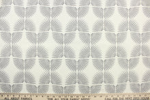 Load image into Gallery viewer, This contemporary screen printed fabric features a caterpillar in varying shades of gray against a white background. 
