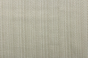 This beautiful color fabric features a herringbone design in a slivery gray tone.