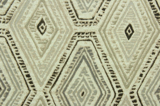 Ricochet is a multi use fabric featuring a diamond design in cream, gray and shades of brown with a distressed appearance.  It can be used for several different statement projects including window accents (drapery, curtains and swags), decorative pillows, hand bags, bed skirts, duvet covers, upholstery and craft projects.  It has a soft workable feel yet is stable and durable.