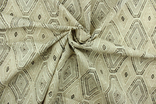 Ricochet is a multi use fabric featuring a diamond design in cream, gray and shades of brown with a distressed appearance.  It can be used for several different statement projects including window accents (drapery, curtains and swags), decorative pillows, hand bags, bed skirts, duvet covers, upholstery and craft projects.  It has a soft workable feel yet is stable and durable.