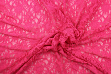 Load image into Gallery viewer,  This lace features a ornamental design in a beautiful rich pink with a stretch. 
